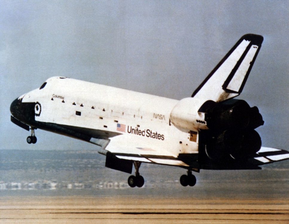 a-left-rear-view-of-the-space-shuttle-columbia-landing-on-a-runway-at-the-nasas-72693b-1024.thumb.jpg.bcc262faaa83ea0b23540839247671b2.jpg